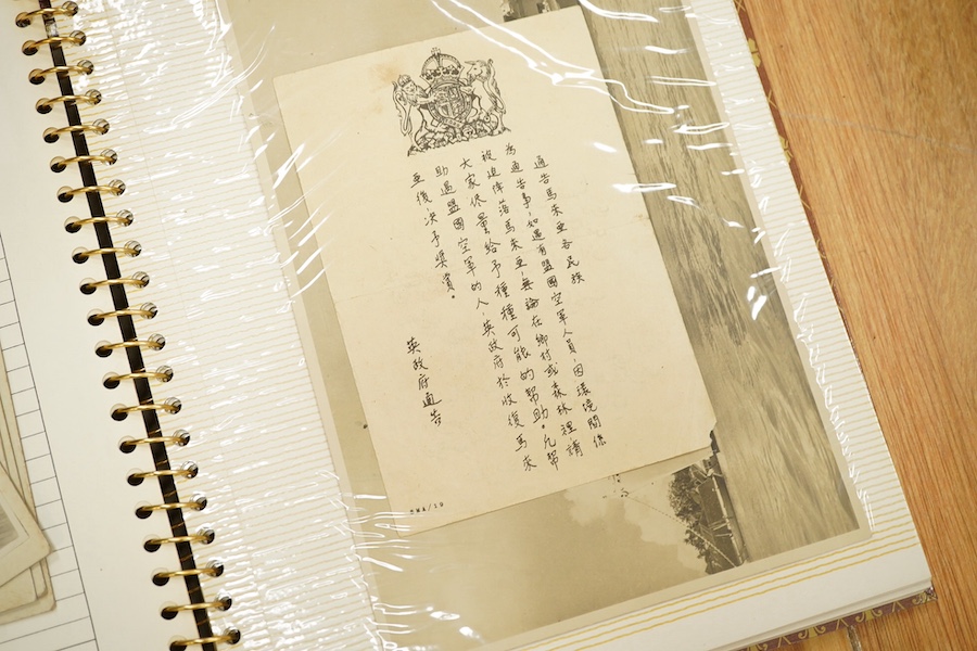 Two photograph albums containing an archive of WWII photos mainly of the RAF in Japan and the Far East, including a number of photos of RAF aircraft, aircraft carriers, Royal Naval ships, photographs of crew, military so